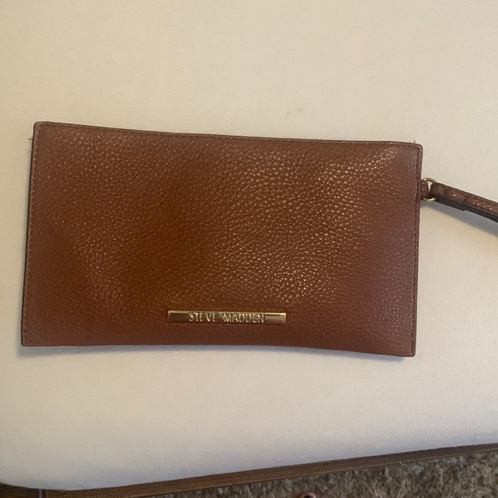 Brown Steve Madden wristlet with handle gold logo
